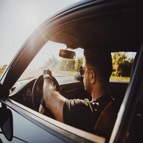 Looking at man through driver side window