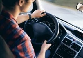 Man driving in car